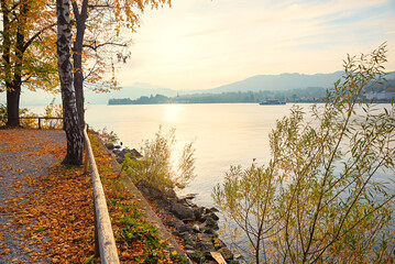 scenery in morning light, lake Traunsee, autumnal shore. tourist resort Grmunden
