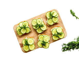 Cucumber Sandwiches with Dill on Wooden Board – Top View

