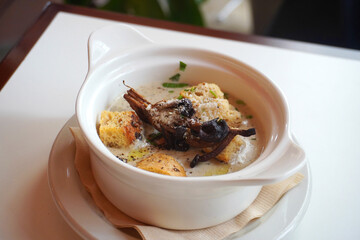 Mushroom soup in a white bowl
