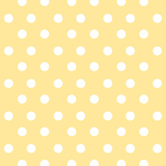 Yellow polka dot background.Vector seamless pattern with white polka dots on a yellow background.