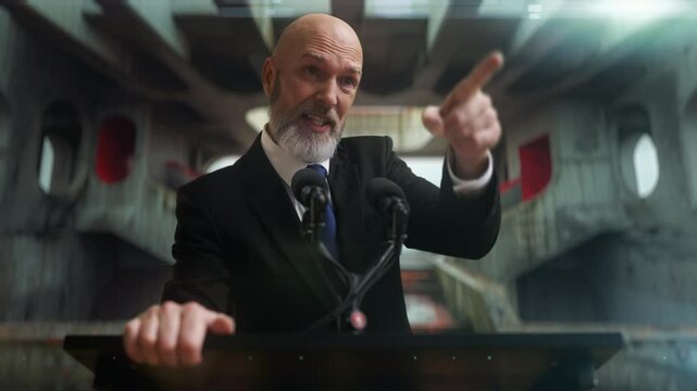 Irritated male dictator speaks angrily at a podium on palace hall background