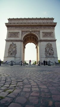 Arc de Triomphe Paris capital of France. Beautiful historical architecture of tourist streets of European city.
