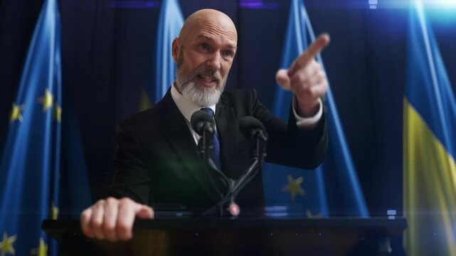 Angry male diplomat speaking angrily during Ukrainian and EU conference