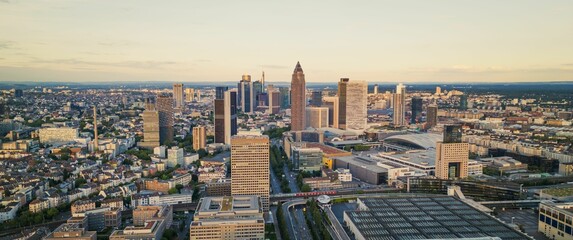 Frankfurt skyline at sunset with modern skyscrapers.