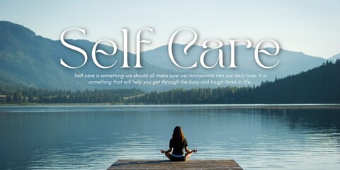 A woman sits cross-legged on a wooden dock by a tranquil lake, surrounded by forested mountains under a clear sky, symbolizing peace, mindfulness, and self-care in nature