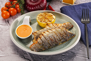 Grilled seabass fillet with lemon