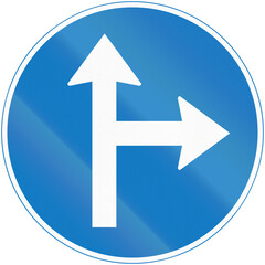 Regulatory road sign in Uganda - Ahead or Turn Right