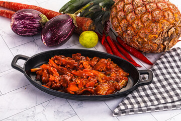 Asian cuisine - pork in chili sauce