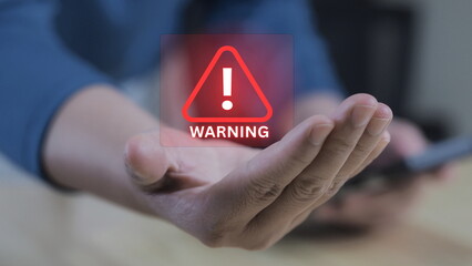 Popup alert on a digital screen, warning of malware or phishing attacks. Represents real-time cybersecurity risk and online safety awareness.