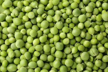 Pile of fresh green peas as background, top view