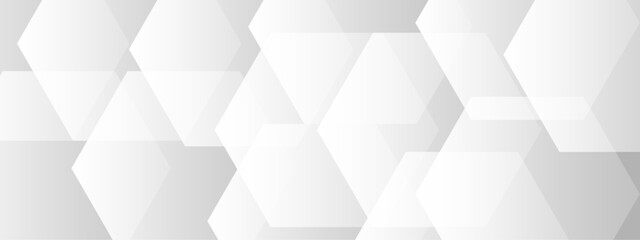 Abstract seamless background with overlapping translucent white hexagons on a light gray to white gradient backdrop.  Clean, minimal, and geometric Ideal for use in tech, corporate, or medical design