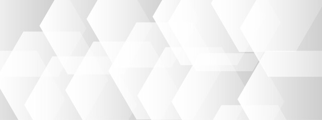 Abstract seamless background with overlapping translucent white hexagons on a light gray to white gradient backdrop.  Clean, minimal, and geometric Ideal for use in tech, corporate, or medical design