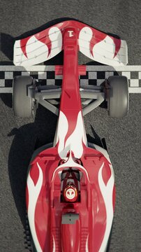 Top view of a generic formula one race car driving across the finish line in slow motion. 3d animation rendering
