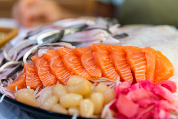 salmon sashimi with rakkyo and gari