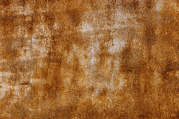 Rusty metal surface in industrial outdoor setting during daytime
