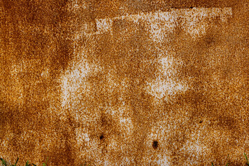 Rusty metal surface with extensive discoloration outdoors