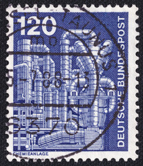 Chemical plant for the production of styrene on a 1975 Germany vintage postage stamp. Industry and...