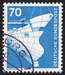 Shipbuilding. Tanker Under Construction on a 1975 Germany vintage postage stamp. Industry and Technology Series