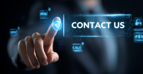 Vibrant photo of businessman touching a virtual screen with "CONTACT US" button, call and text icons on a hologram interface for customer support service concept. Business.