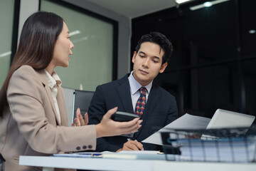 Asian business people working as a good team in the office. Successful teamwork in a meeting,...