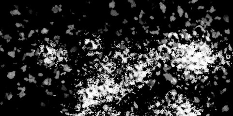 Snowflakes on dark background. white icy snowflakes isolated on black background, natural background. white crystalline powder on a black background. sugar dust. texture, pattern and clipping.