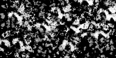Snowflakes on dark background. white icy snowflakes isolated on black background, natural background. white crystalline powder on a black background. sugar dust. texture, pattern and clipping.