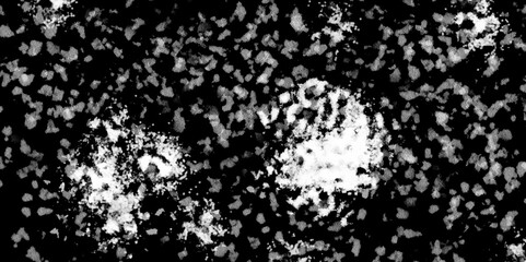 Snowflakes on dark background. white icy snowflakes isolated on black background, natural background. white crystalline powder on a black background. sugar dust. texture, pattern and clipping.