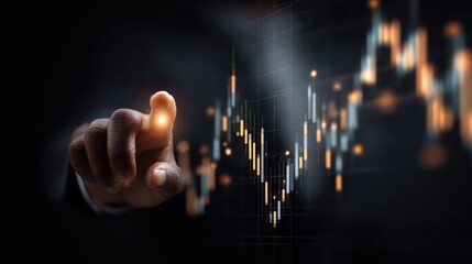 Hand points to glowing financial chart data in a dark setting.