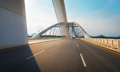 Modern bridge highway asphalt road and city background. car use background.