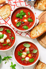 Roasted Tomato Soup with Mozzarella and Basil Caprese Style.selective focus