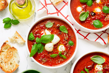 Roasted Tomato Soup with Mozzarella and Basil Caprese Style.selective focus