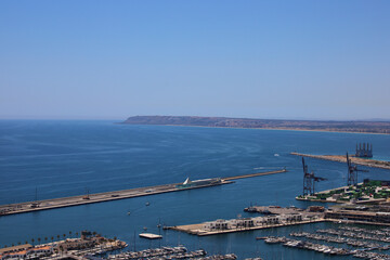 Alicante Harbor and Coastal Landscape with Marina, Cargo Cranes, and Cape Santa Pola Peninsula...