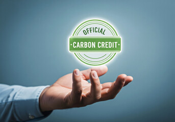  hand presents a glowing green carbon credit seal, signifying environmental responsibility