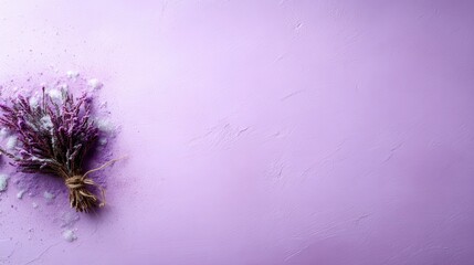 A delicate arrangement of dried lavender on a soft purple backdrop, representing natural beauty and tranquility, perfect for creating a calm and soothing ambiance.