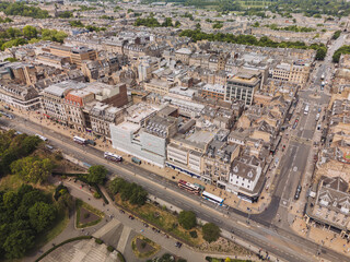 Edinburgh Scotland: 18th May 2025: Drone view of Princes Street in Edinburgh showcasing city life and architecture on a sunny day