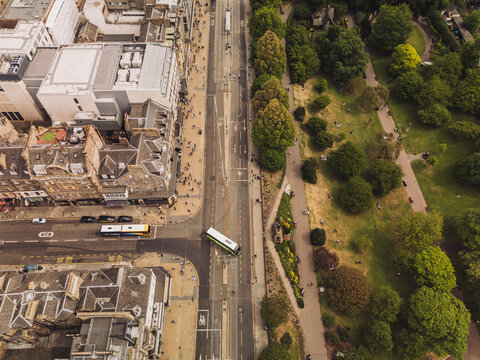 Edinburgh Scotland: 18th May 2025: Drone view of Princes Street in Edinburgh showcasing city life and architecture on a sunny day