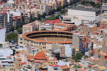 Alicante Bullring (Plaza de Toros) Aerial View Surrounded by Historic Urban Architecture and Modern Auditorium in City Center