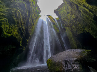 Discover the captivating beauty of Gljufrabui waterfall Iceland lush landscape