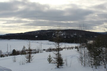 winter landscape with lake and mountains