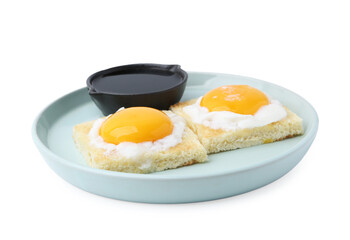 Tasty kaya toasts with half-boiled eggs and soy sauce isolated on white. Traditional asian breakfast