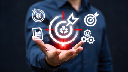Man holding digital icons representing business goals strategy and team collaboration