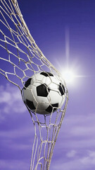 Soccer ball scoring a goal in the net with a bright sun flare