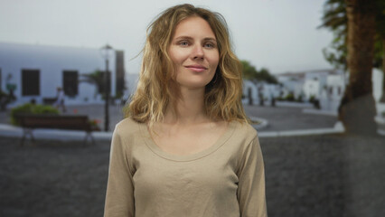 Woman face smiling street blonde young hair portrait town outdoor captures casual wanderer spirit.