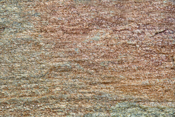 The background is made of brown granite with beautiful veins. Texture backgrounds for wallpaper design graphics.