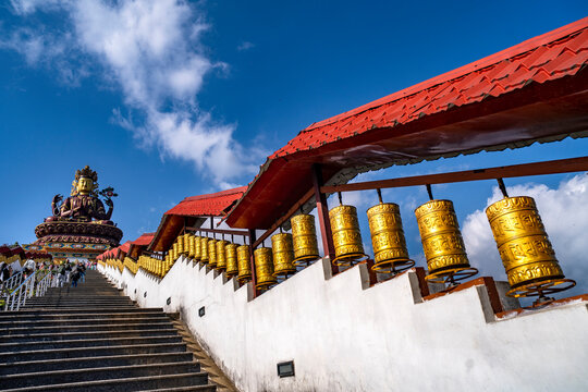 The beautiful and world's tallest statue of Chenrezig in the Pelling, West Sikkim, India.  View of A Huge metallic statue of Chenrezig at Sangha Choeling.