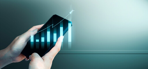 hand of businessman interactive touching a holographic of transaction financial network data...