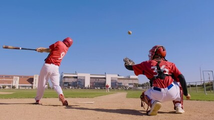 Baseball Player Misses the Ball During a Game - Powered by Adobe