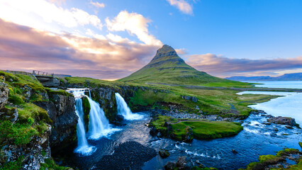 Majestic Kirkjufell Mountain and Waterfall under a Colorful Sky at Sunset in Iceland