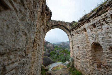 Historical places on the magnificent Latmos trekking route. Latmos Carian road,
Yediler Monastery and Castle. Historical ruins on the Latmos Carian road.Muğla, Turkey.
