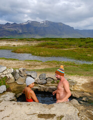 Relaxing in Landbrotalaug Hot Spring surrounded by Icelands stunning landscapes